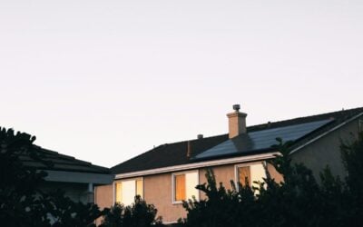 Solar panels on a home rooftop at dusk