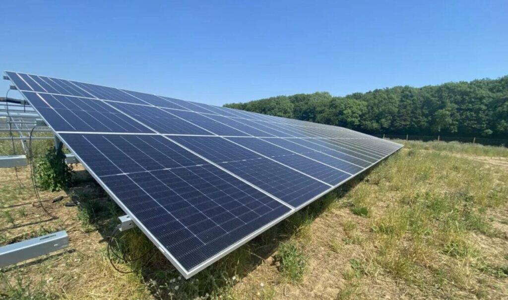 Solar panels outside, close up, under a blue sky