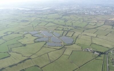 a drone shot of a solar farm