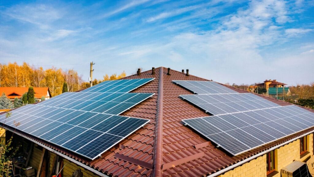 solar panels on two sides of a rooftop